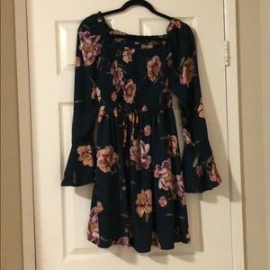 Off the shoulder green floral dress.